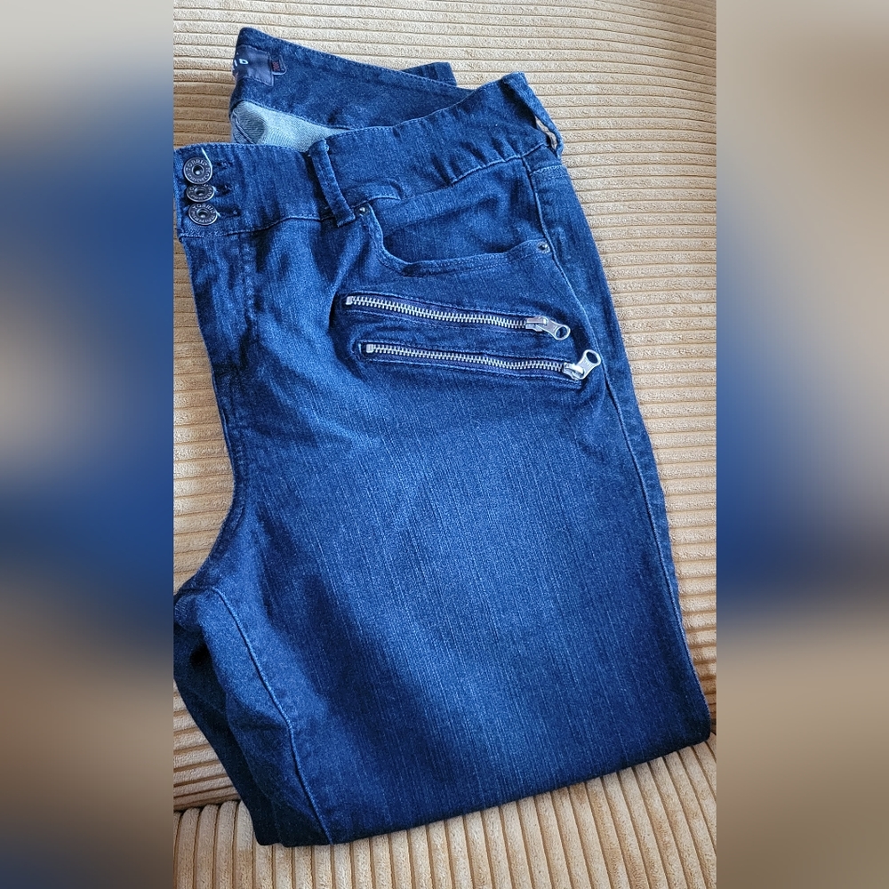 Torrid jegging with zipper detail. Darker blue. Never worn size 20regular